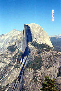 mid afternoon view of Half Dome from Glacier Point