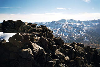 the summit of Sonora Peak in the foreground and Leavitt Peak in the background